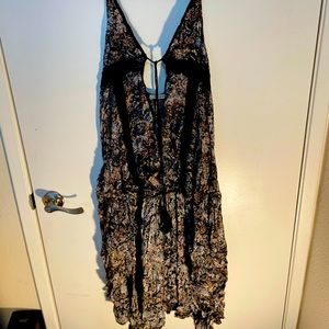 Black floral print open high low blouse